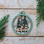 Load image into Gallery viewer, Set of 2 Wooden Ornaments in a Christmas Ball Shape with a 3D Effect Hand-painted Winter Wonderland with reindeer Christmas forest
