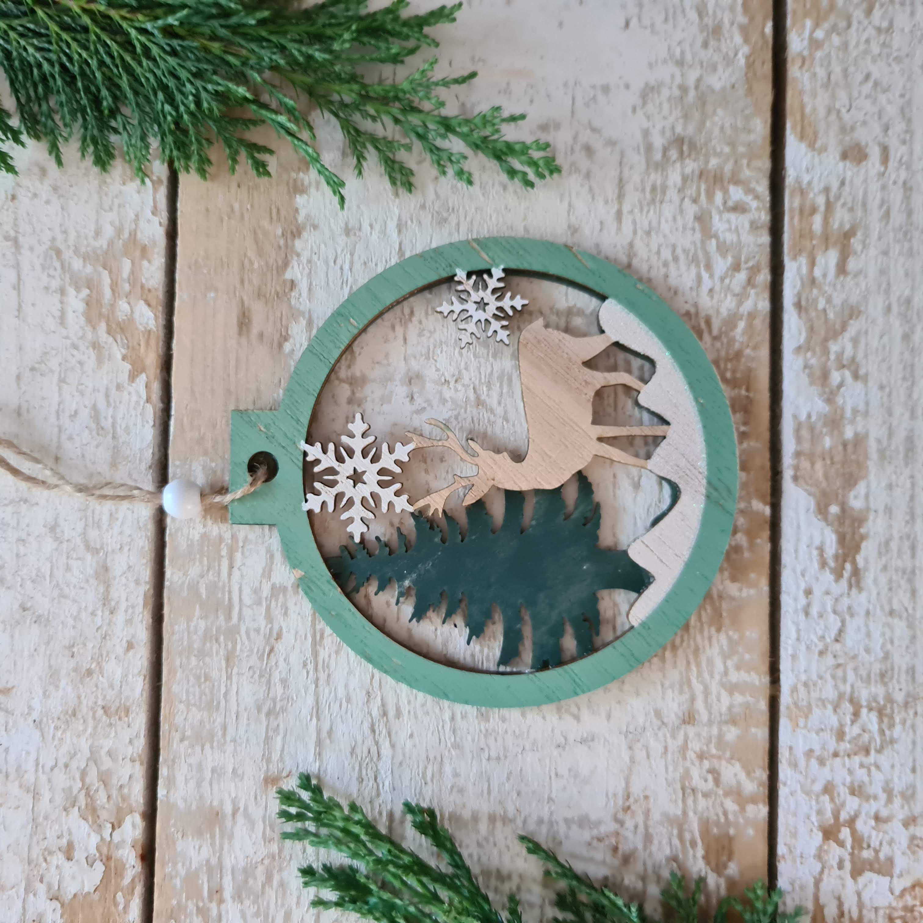 Set of 2 Wooden Ornaments in a Christmas Ball Shape with a 3D Effect Hand-painted Winter Wonderland with reindeer Christmas forest