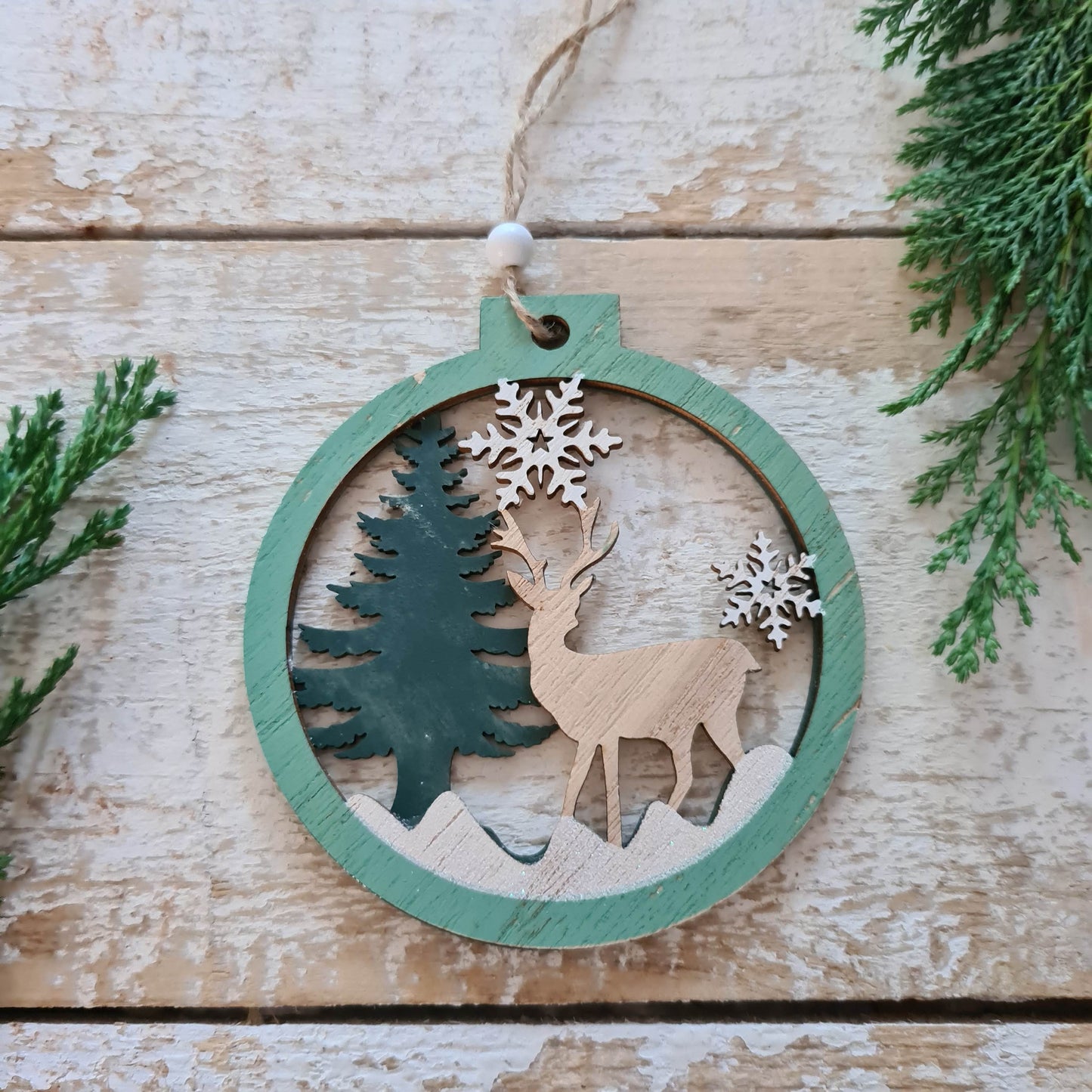 Set of 2 Wooden Ornaments in a Christmas Ball Shape with a 3D Effect Hand-painted Winter Wonderland with reindeer Christmas forest