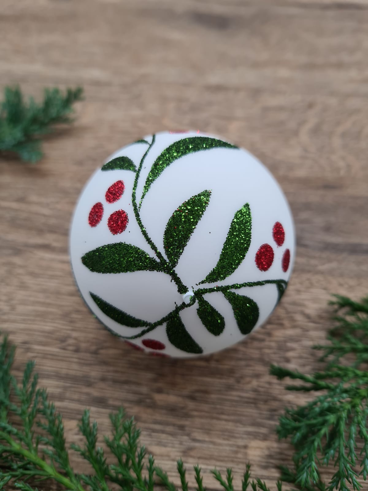 Mouth-Blown white bauble with hand-painted wildflowers with glitter paint