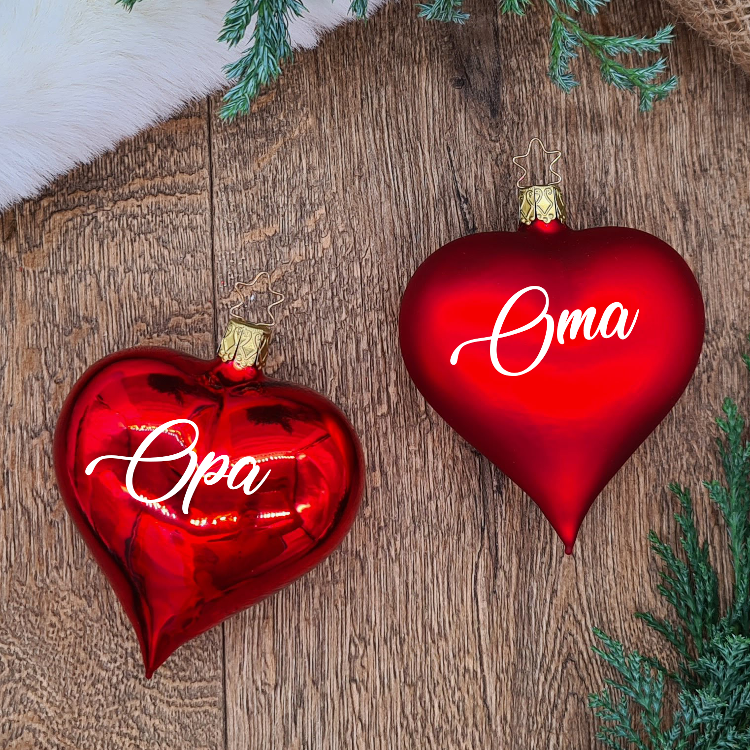 Set of 2 red heart-shaped glass Ornaments with white text