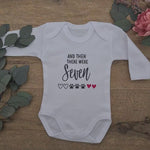 Load and play video in Gallery viewer, Pregnancy Announcement Onesie - &quot;And then there were Seven (7)&quot;
